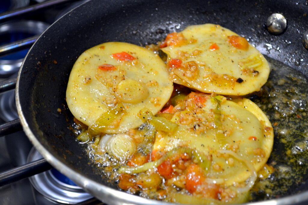 Ravioli in frying pan